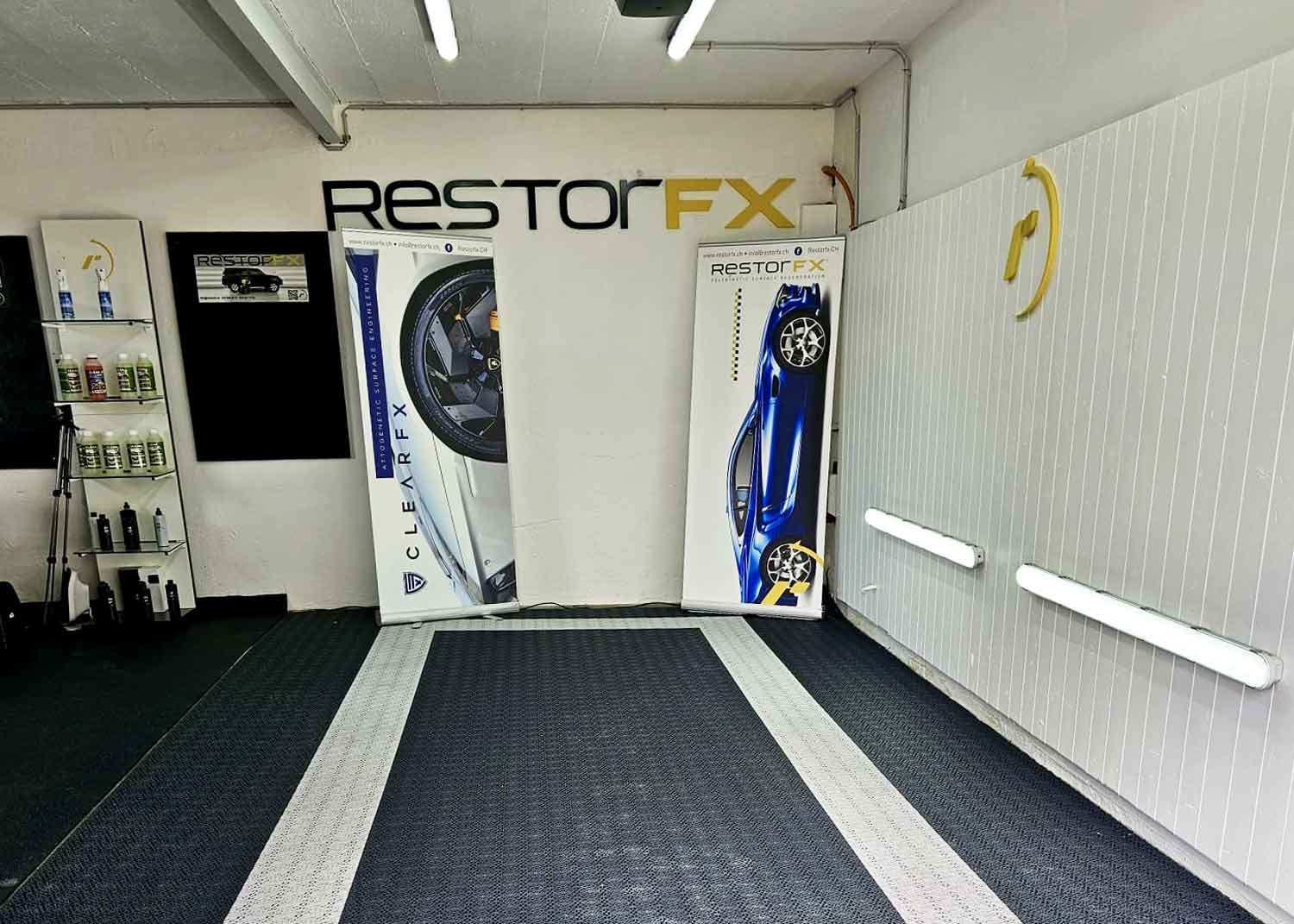 RestorFX Yverdon Les Bains shop area with branded wall and signage